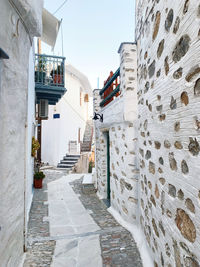 Narrow alley amidst buildings in city