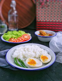 High angle view of breakfast served on table