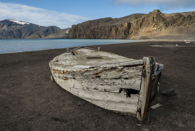 Abandoned boat on beach