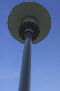 Low angle view of street light against clear blue sky