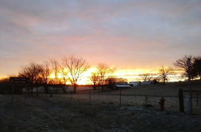 Scenic view of landscape at sunset