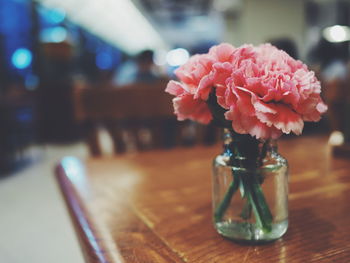 Close-up of flower vase on table