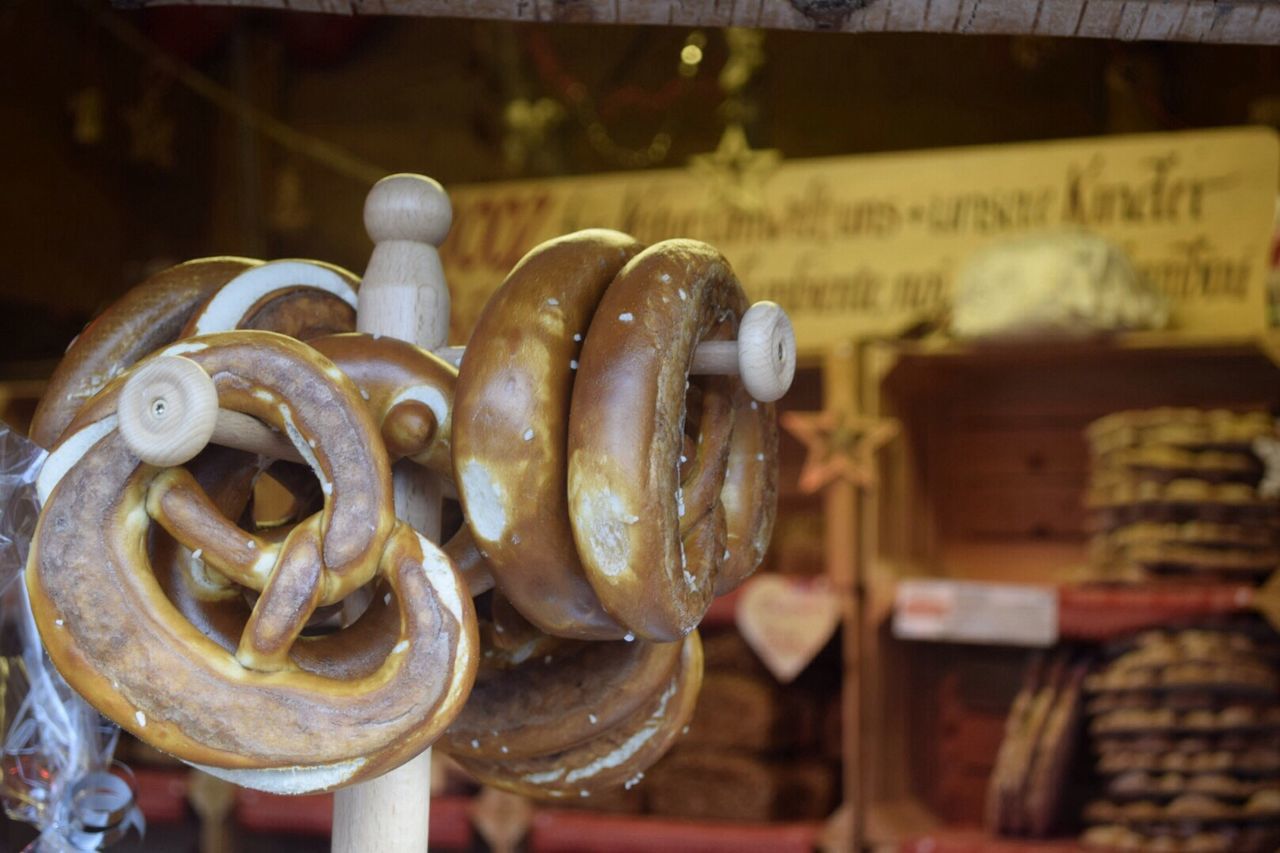 indoors, close-up, focus on foreground, still life, selective focus, for sale, retail, food and drink, large group of objects, text, no people, food, abundance, metal, store, table, freshness, variation, display, day