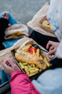 High angle view of man holding food