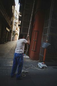 Woman standing on city street