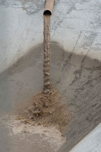 High angle view of pipe on wall