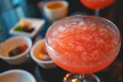 Close up of tiny welcome colorful cocktail set for hotel guest.