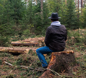 Rear view of man in forest