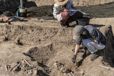 Archaeologist working at archaeology site