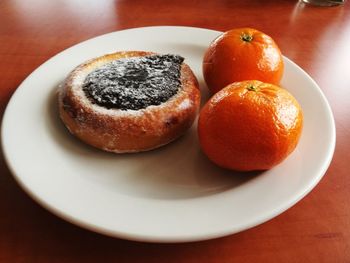 Close-up of fruits on plate