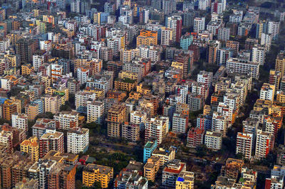 High angle view of illuminated modern buildings in city