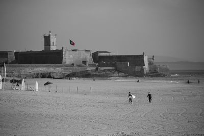 Woman standing on beach