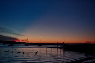 View of calm sea at sunset