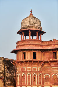 Low angle view of historic building against clear sky