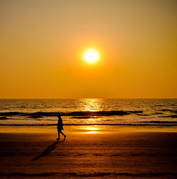 Scenic view of sea at sunset