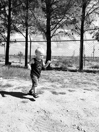 Boy playing on field