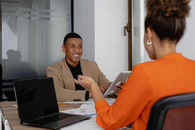 Business colleagues working at office