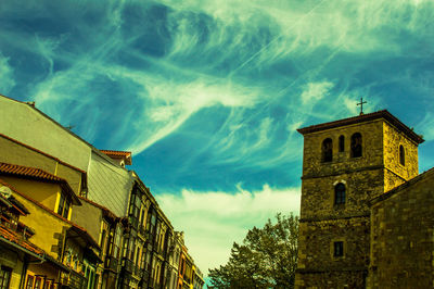 Low angle view of old building against sky