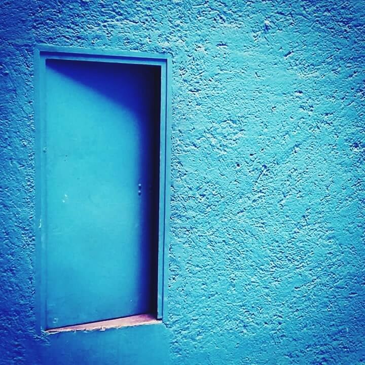 CLOSE-UP OF BLUE DOOR