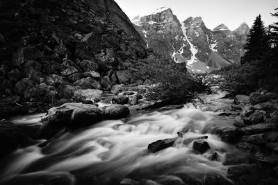 Scenic view of stream flowing through rocks