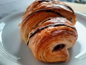 Close-up of croissant in plate