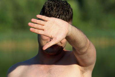 Close-up of shirtless man