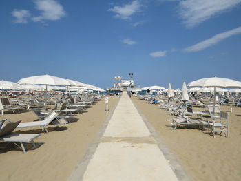 Panoramic view of beach against blue sky