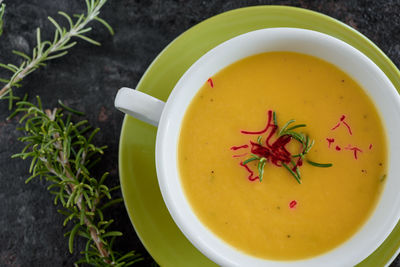 Directly above view of soup in cup