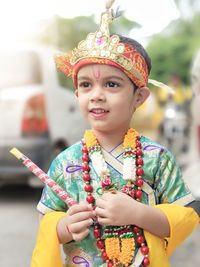 Portrait of cute girl wearing krishna costume 