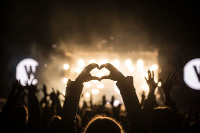 People in concert at night