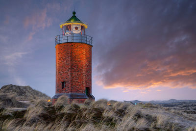 Panoramic image of kampen lighthouse against evening sky, sylt, north frisia, germany