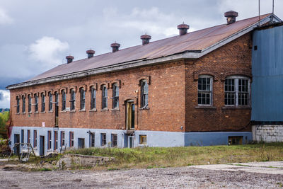 Low angle view of old building against sky