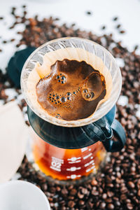 High angle view of coffee cup on table