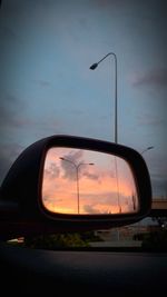 Reflection of street light on side-view mirror