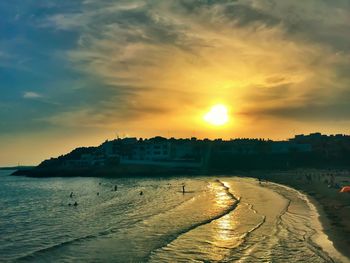 Scenic view of sunset over river