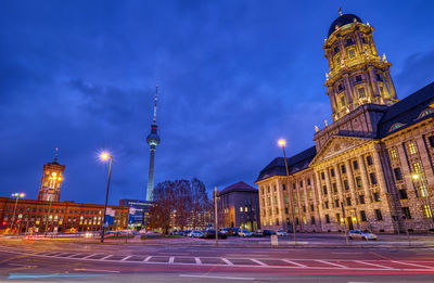 The molkenmarkt in berlin with the altes stadthaus, the town hall and the television tower at night