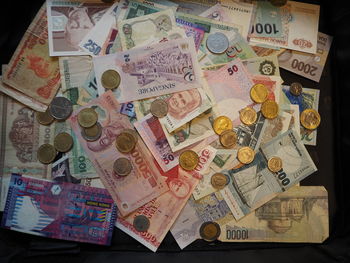 High angle view of coins on table