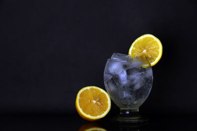 Close-up of drink against black background