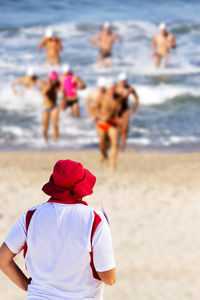 Lifeguard lifesafer championships in swimming race with officials 