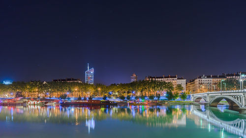 Illuminated cityscape at night