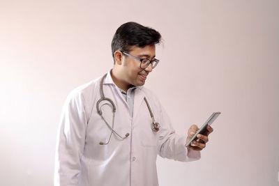 Young man using mobile phone