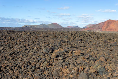 Volcanic landscape with lava field  and mountain with different colours  on canary island lanzarote