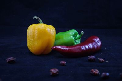 Close-up of yellow bell peppers on table