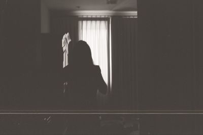 Woman standing in a hand