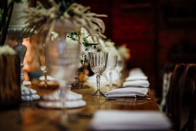 Luxury table settings for fine dining with and glassware, beautiful blurred background. for events