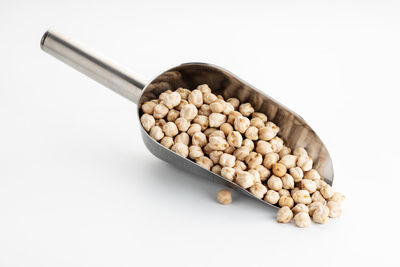 High angle view of eggs against white background