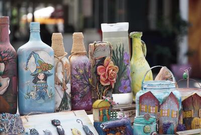 Close-up of bottles for sale