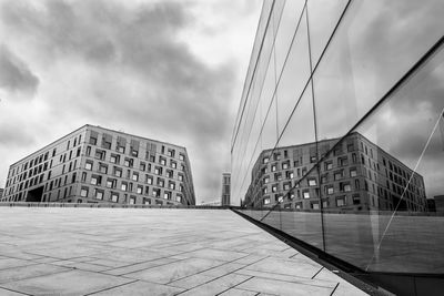 Low angle view of modern building against sky in city