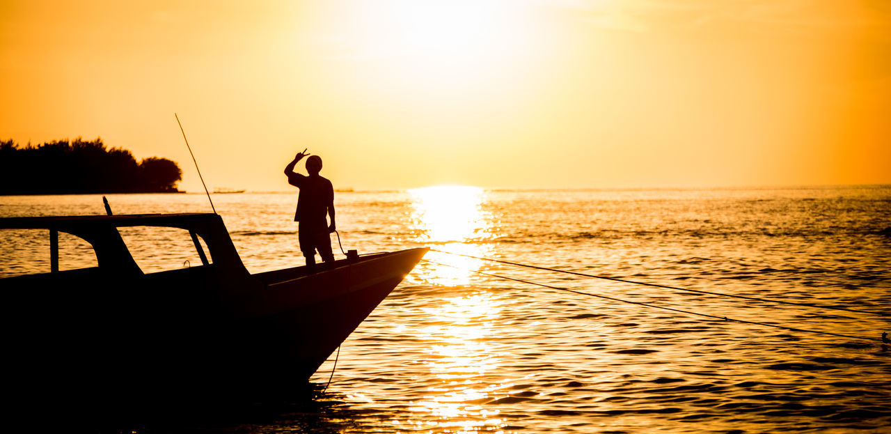 sunset, sky, water, sea, beauty in nature, silhouette, orange color, scenics - nature, transportation, mode of transportation, nautical vessel, nature, standing, sun, horizon, one person, sunlight, lifestyles, tranquility, horizon over water, outdoors