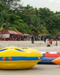 People in swimming pool at beach